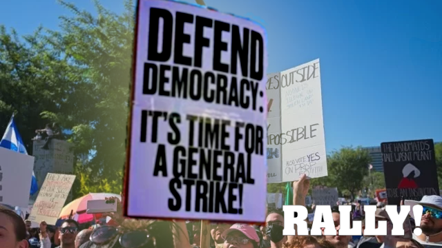 Los Angeles, CA. October 18, 2025 – No Kings marcher suggests a way to bring struggles together Credit: Betto Rodrigues