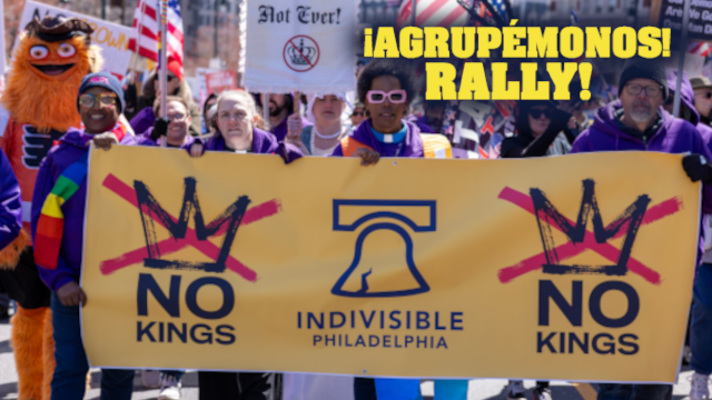 Rally - No Kings 1a rev amer - People marching in a rally, holding a yellow banner that reads 'NO KINGS' with crossed-out crowns and 'INDIVISIBLE PHILADELPHIA'; a bold banner above says '¡AGRUPÉMONOS! RALLY!'